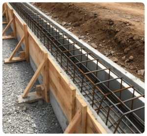 Concrete footer formwork with rebar reinforcement in a trench in Richmond VA